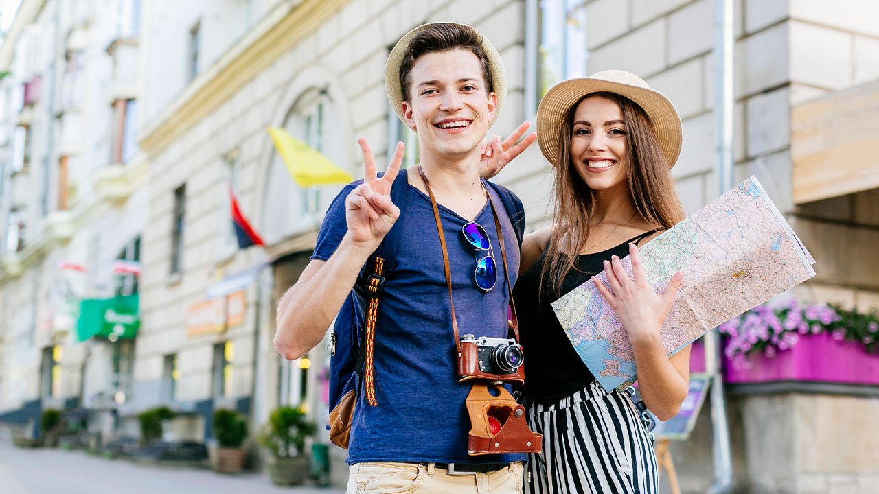 Couple with a map exploring a new city